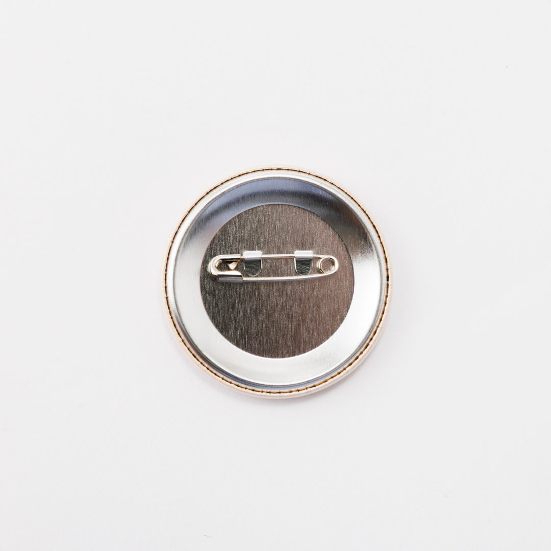 Tin badge large (Robot-like creature)