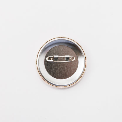 Tin badge large (Robot-like creature)